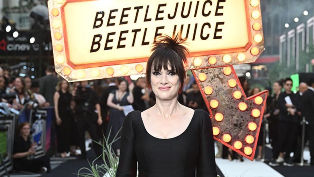 Winona Ryder in Prada wearing her signature 'Beetlejuice Beetlejuice' London Premiere