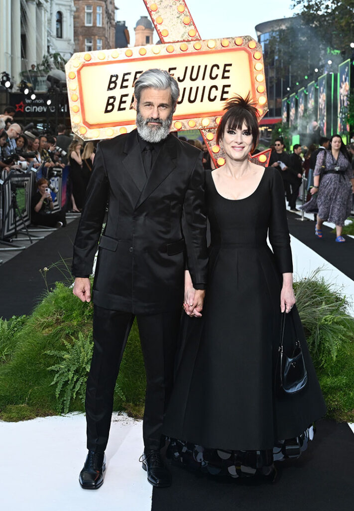 Winona Ryder in Prada wearing her signature 'Beetlejuice Beetlejuice' London Premiere