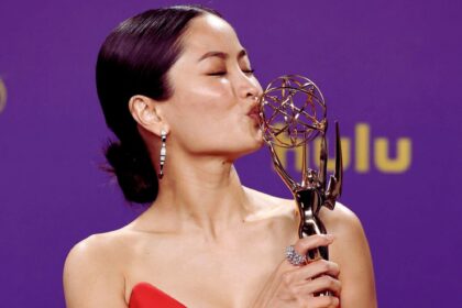 Anna Sawai poses with her historic Emmy