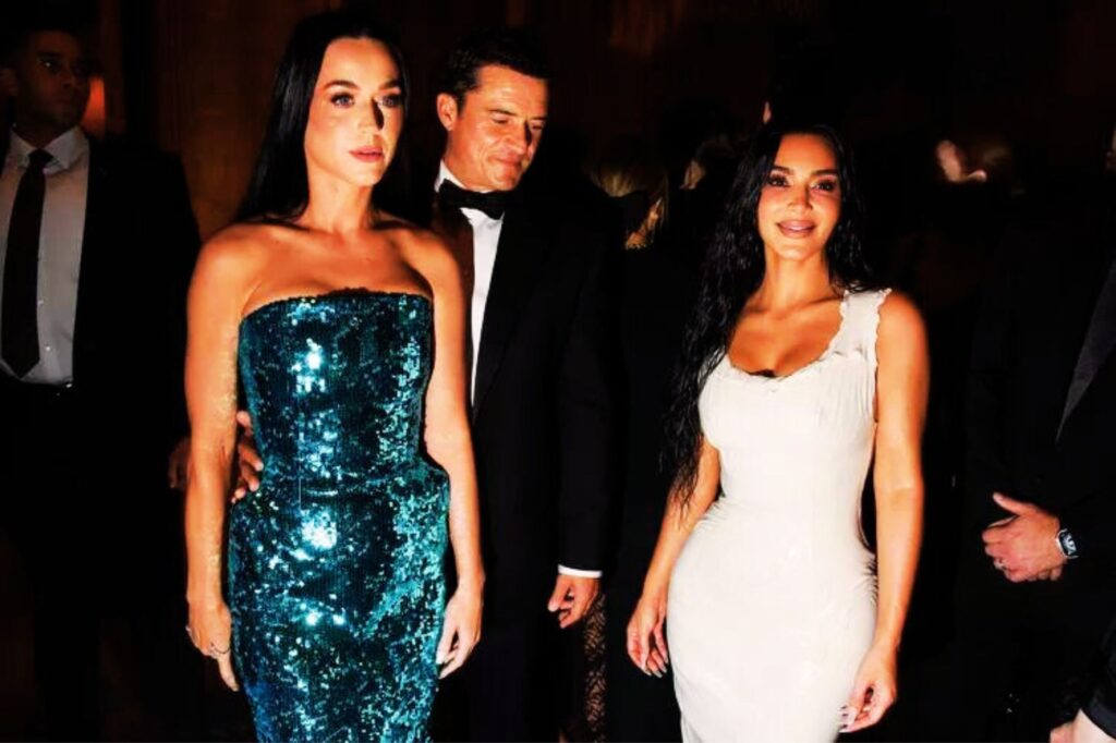 Katy Perry stands with Orlando Bloom and Kim Kardashian - seen together at the Caring Foundation's Caring for Women Dinner on September 9, 2024, in New York City.