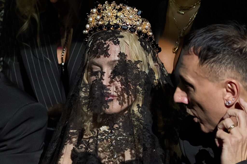 Madonna Turns Heads in Bold Black Veil and Crown at Milan Fashion Week 2024