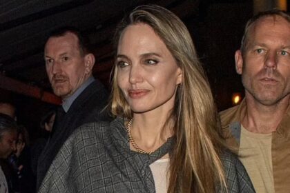 Angelina Jolie Stuns in Chic Autumn Look with Cape